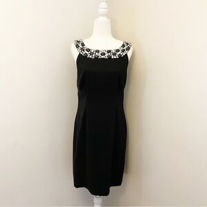 Little black dress size 12 black with jeweled detail.